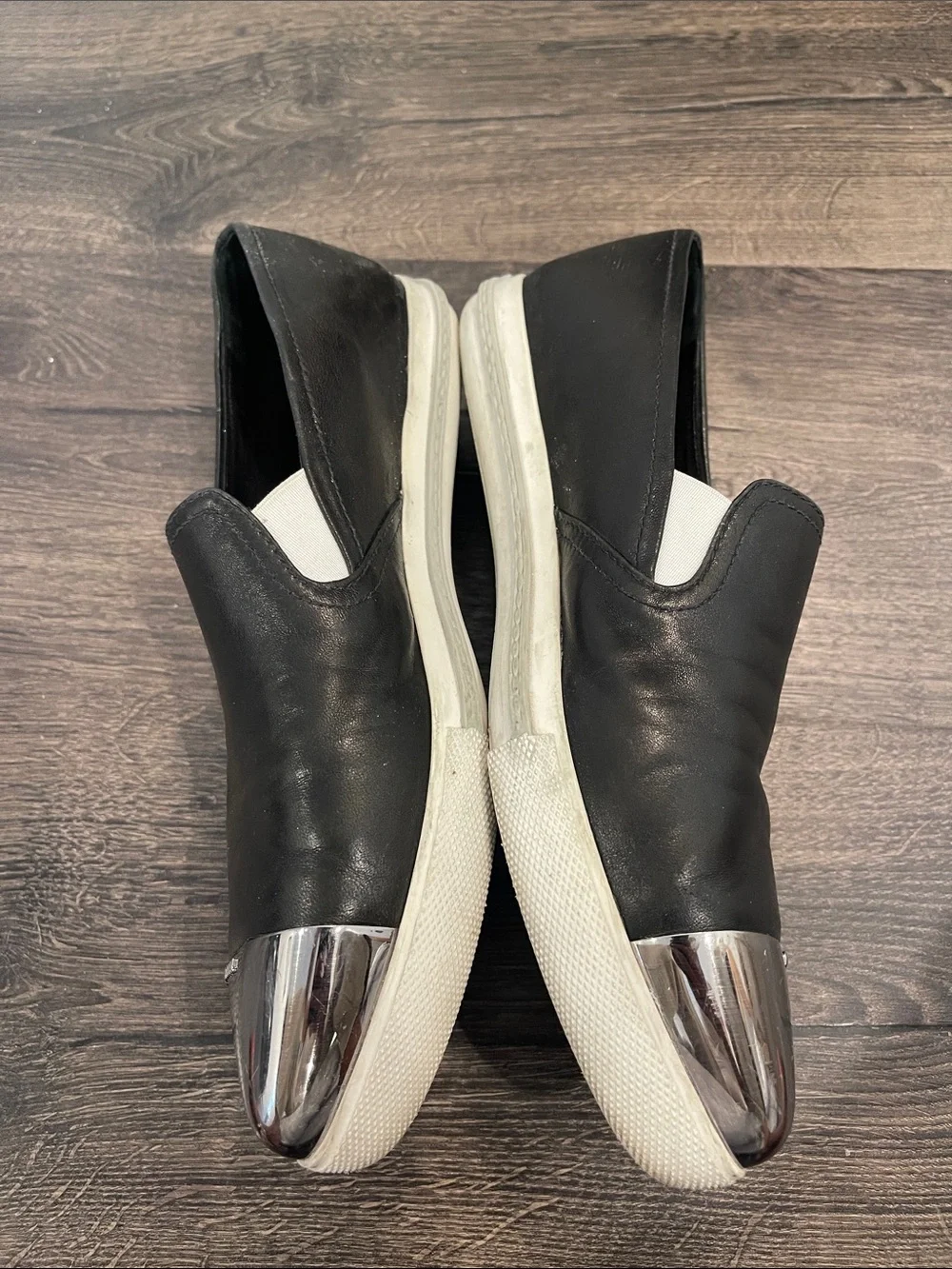 Miu Miu Black Leather Slip-Ons with Silver Cap Toe - Picture 8 of 9